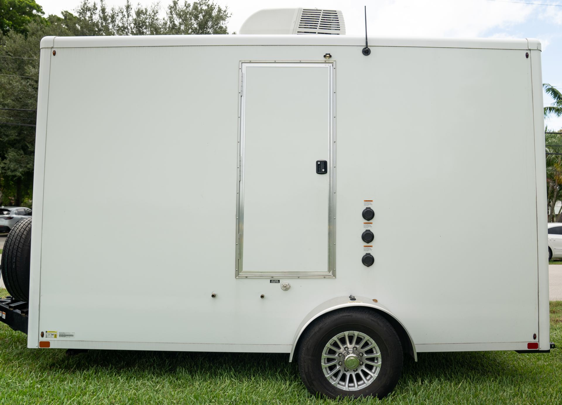 VIPee branded restroom trailer parked at an event venue