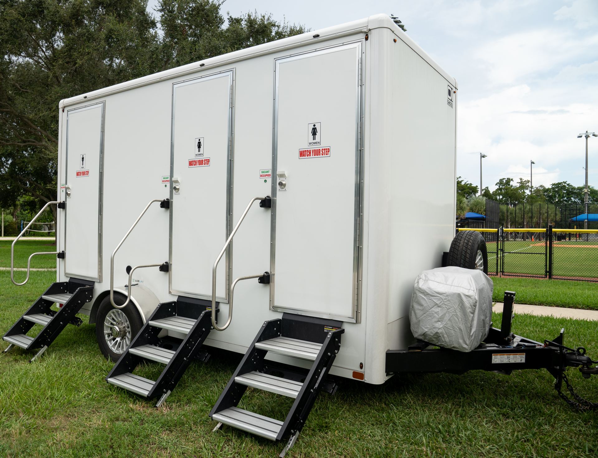 VIPee luxury restroom trailer exterior at an event