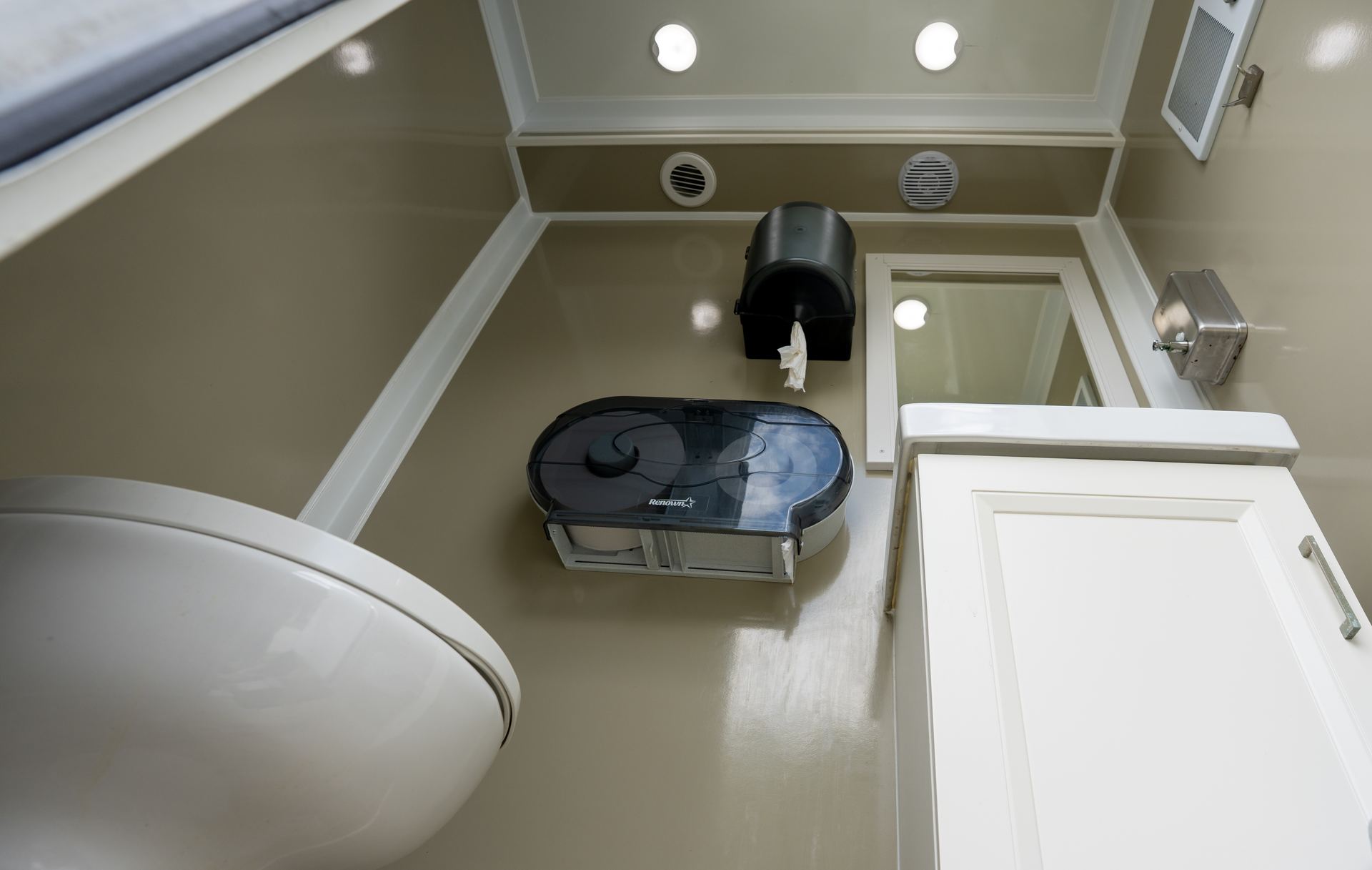 Private restroom stall inside the VIPee trailer